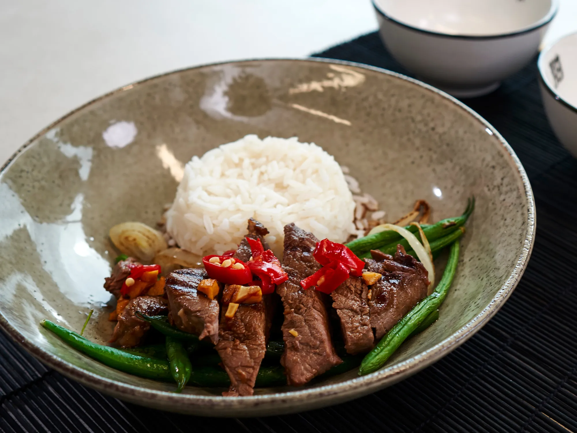 A photo of a beef and rice dish.